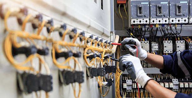 Professional Electrician technician working in Headland, AL